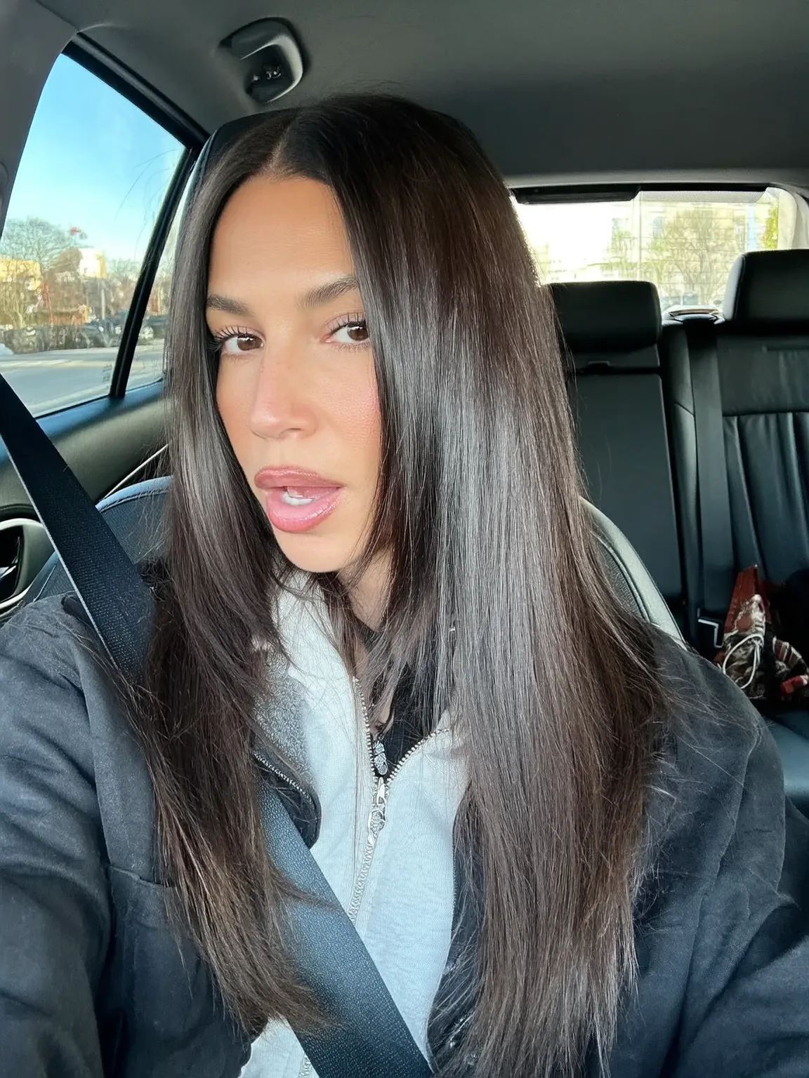 Rich Chestnut Brown Long Layers with Sleek Finish